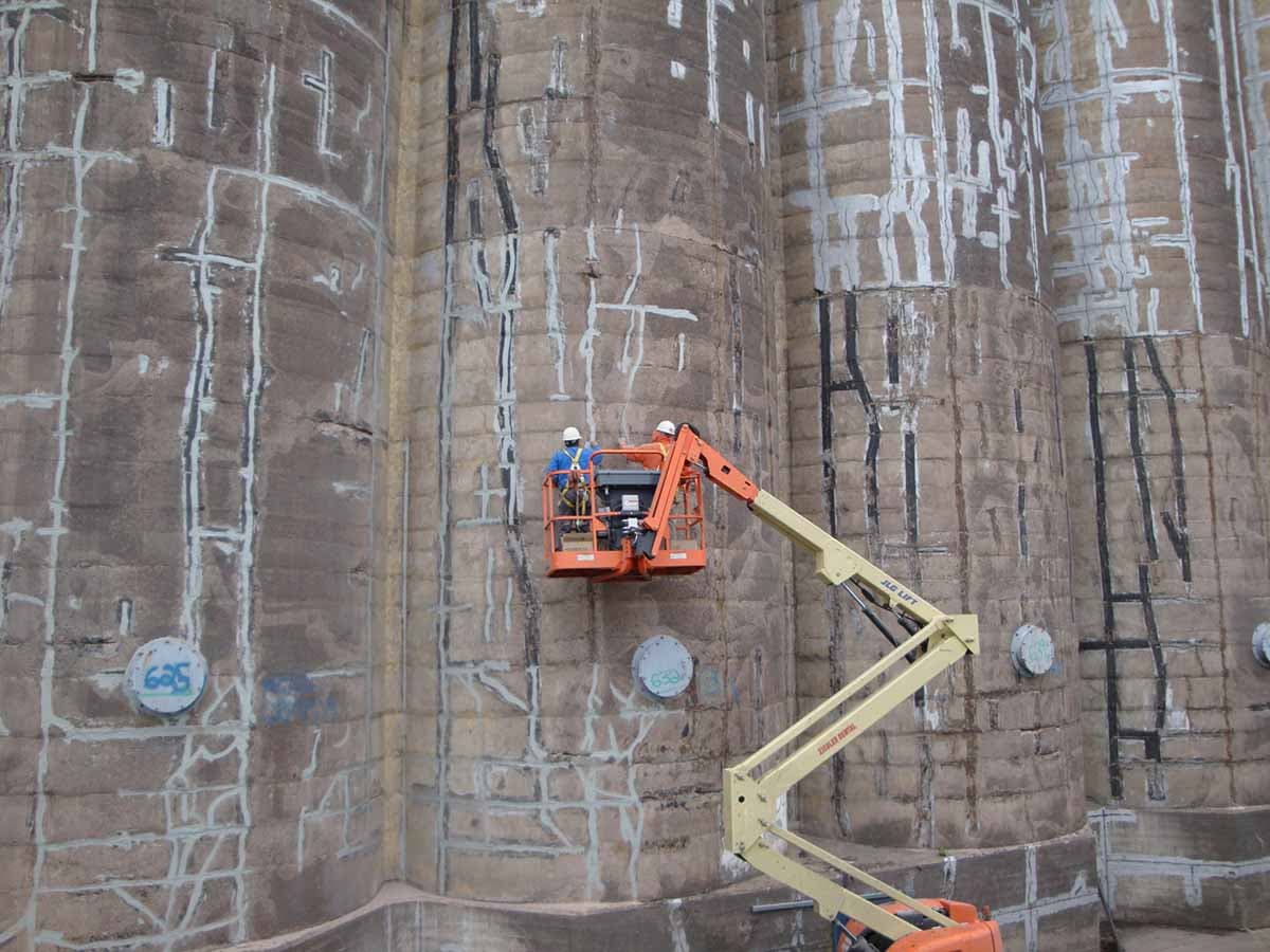 Silo Repair Workers on Lift